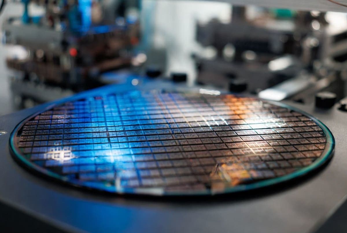 Silicon wafer with AI accelerator chips on a semiconductor fabrication line